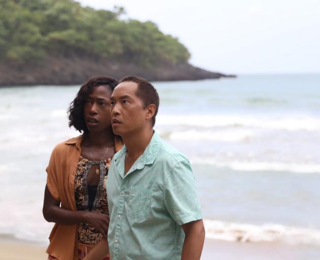 Patricia (Nikki Amuka-Bird) and Jarin (Ken Leung) in Old, written for the screen and 
...