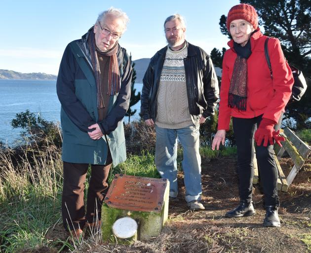 Back Beach Writers members (from left) John Holmes, Robert Free, and Anna Holmes are saddened by...