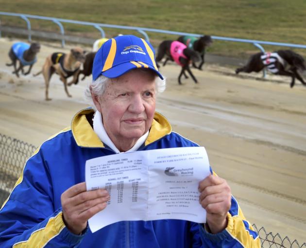 Hill checks the dogs’ form. PHOTO: PETER MCINTOSH