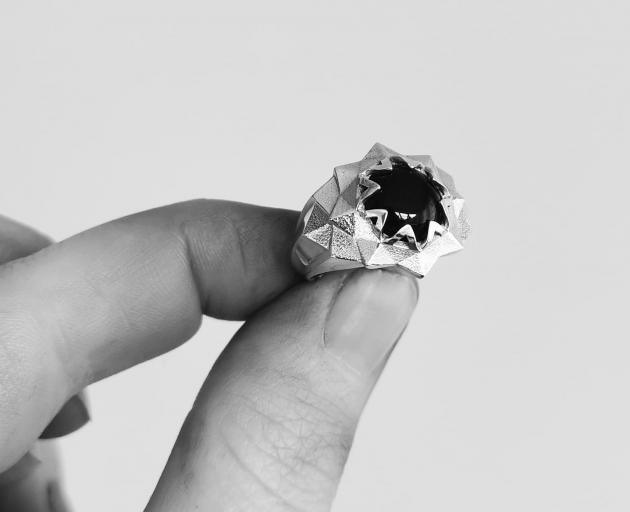 Star Ring, featured in sterling silver, set with a black onyx stone. A timeless classic and the...