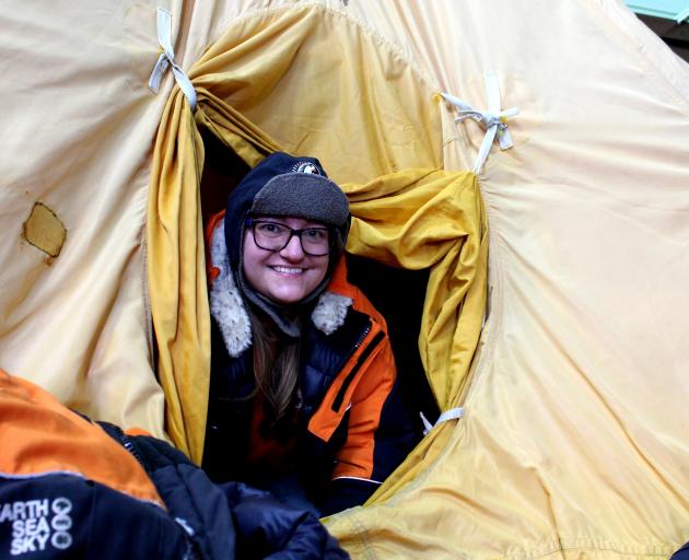 Far From Frozen venue co-ordinator Jessica Davis demonstrates the type of clothing and tent...