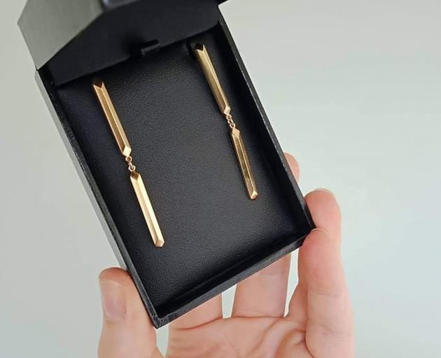 Customised Parallel Stud earrings draw from architecture, inspired by pillars. Made from gold...