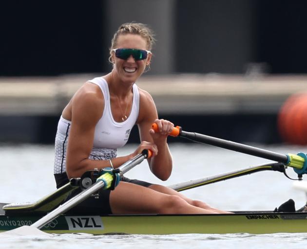 New Zealand's Emma Twigg was rewarded for her perseverance with a gold medal after getting fourth...