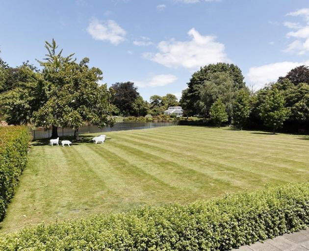 The lawns and gardens overlooked the glass house of Christchurch's much loved Mona Vale Homestead...