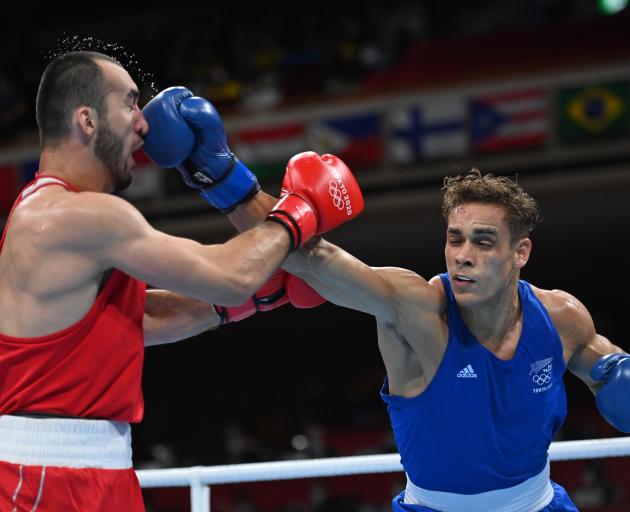 David Nyika (R) fought Muslim Gadzhimagomedov in the semifinal of the men's heavyweight boxing...