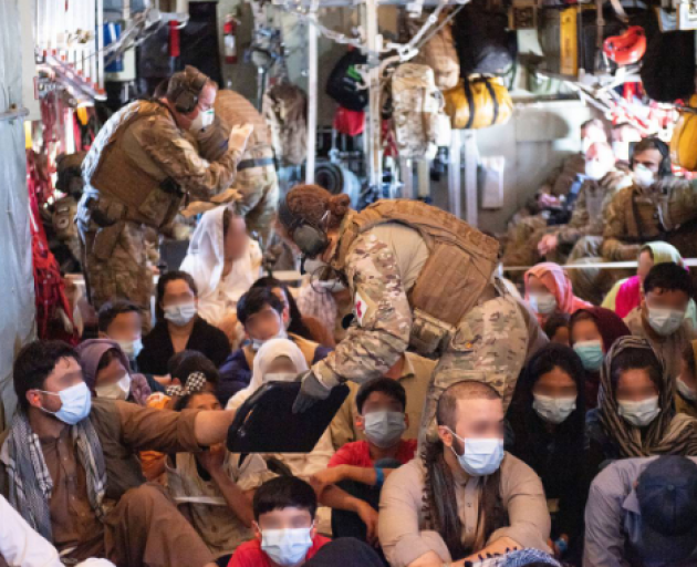 Inside the RNZAF C130 after its first mercy dash in and out of Kabul's airport. Photo : NZDF