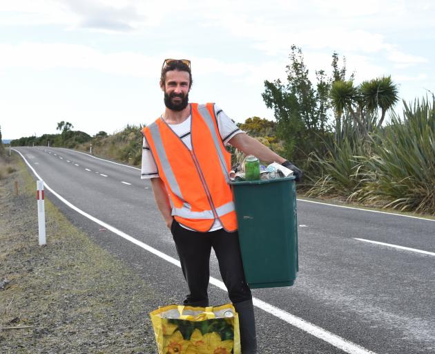 Andrew Earl-Peacock uses his lockdown spare time to collect roadside litter near his Brighton...