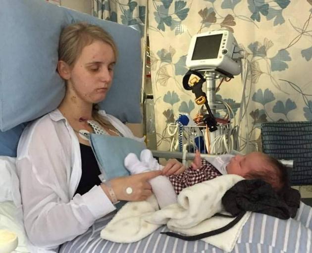Nicholas with her niece in hospital. Photo: Supplied