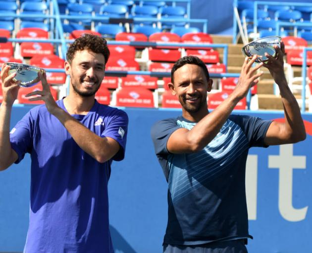 Ben McLachlan of Japan and Raven Klassen of South Africa celebrate winning the doubles final match against Michael Venus of New Zealand and Neal Skupski of Great Britain Citi Open. Photo: Getty Images