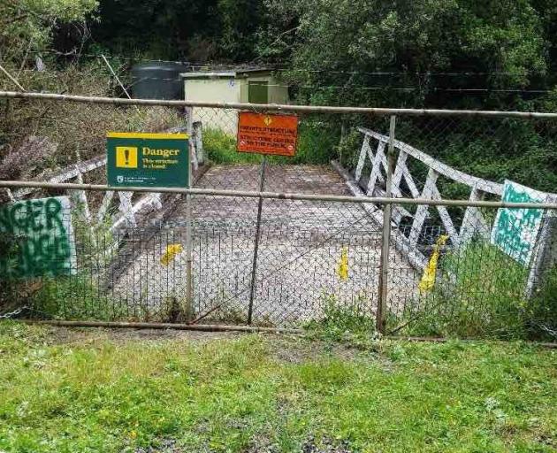 Doc has closed Goys Track Bridge in Waipori Falls, which provides access to the self-governing town’s freshwater pump house. PHOTO: DANIEL WILLIAMSON/SUPPLIED