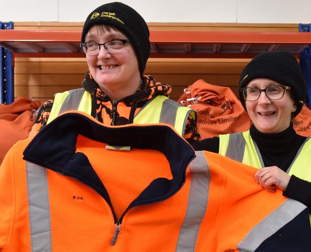 Cargill Enterprise’s Sharon Thorley (left) and Michella van Nugteren hold a reconditioned jacket...