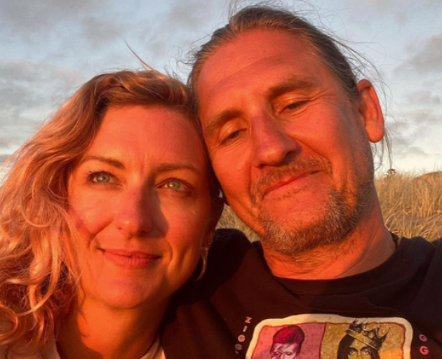 Jenene Crossan and her husband Scotty Chapman near their Piha Beach home. Photo: Supplied
