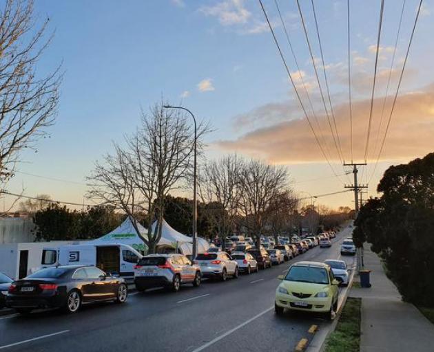 Lines of traffic heading to the Northcote community testing centre in Auckland. Photo: RNZ / Jean...