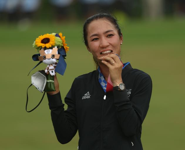 Lydia Ko with her bronze medal to go with the silver she won at Rio in 2016. Photo: Getty Images