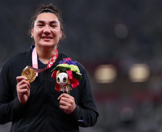 Lisa Adams of Team New Zealand celebrates with the gold medal during the medal ceremony after winning the Women’s Shot Put - F37 Final. Photo: Getty Images