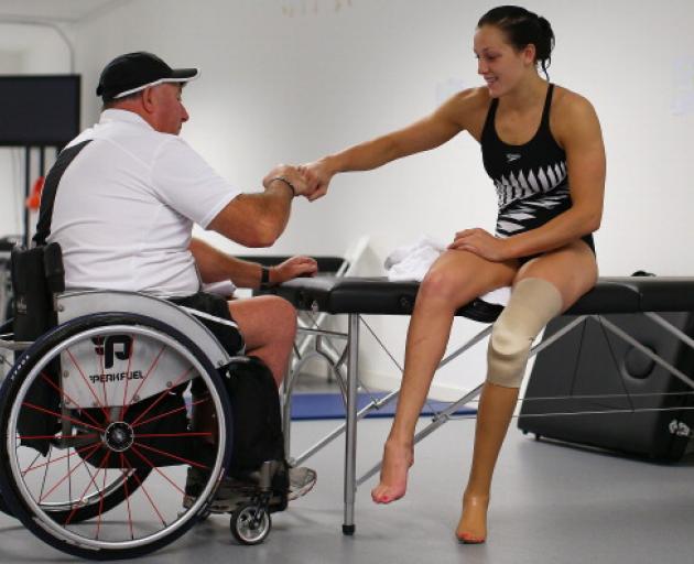 Sophie Pascoe with her long-time coach Roly Crichton. Photo: Getty Images