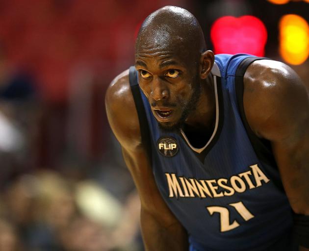 Garnett looks on during one of his final games for the Minnesota Timberwolves. PHOTO: GETTY IMAGES
