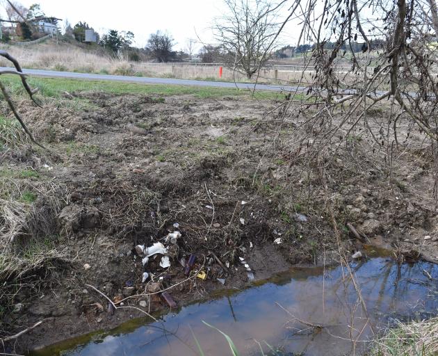 Ageing rubbish litters the edge of the Hawksbury Lagoon Wildlife Refuge. PHOTOS: GREGOR RICHARDSON
