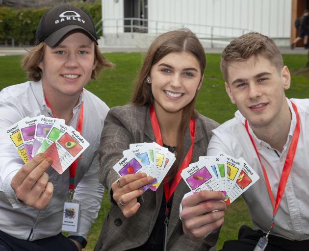 Year 13 students Oakley Inkersell, Rosa Kelly and Aljaz Smrekar show off Food Fight. Photo: Geoff...