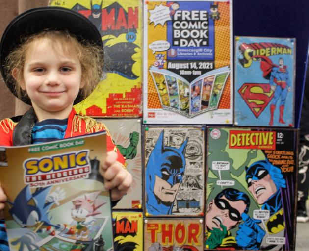 Tate Feaver (5) happily shows the comic book he won at the Free Comic Book day at Invercargill...