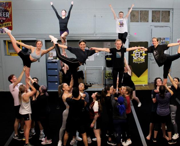 Members of the Otago University Students’ Association Cheerleading, Stunt and Tumble Club...