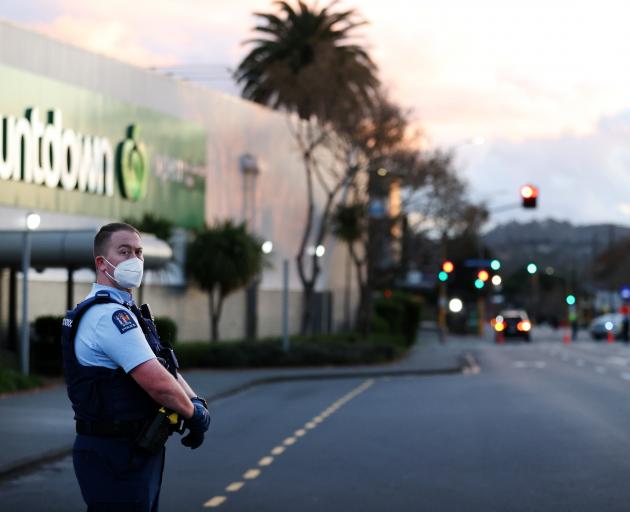 Police guard the area around Countdown Lynn mall  last evening after a terrorist attack earlier ...