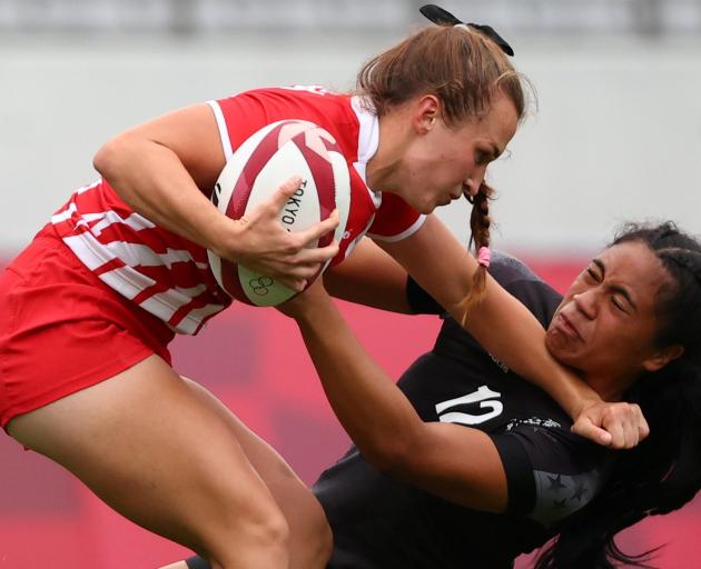Alina Arterchuk of the Russian Olympic Committee in action against New Zealand’s Alena Saili...
