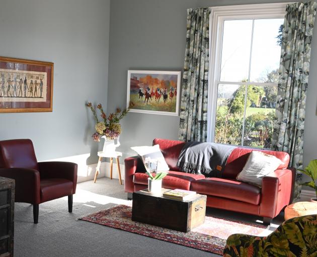 Just off the open-plan living area, a former bedroom became a lounge. PHOTO: LINDA ROBERTSON