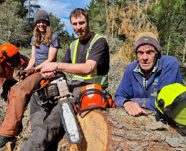 For nearly two weeks foresters (from left) Lauren Queree, Dan Stewart and Peter Fleming have been...