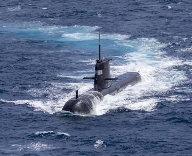 The Royal Australian Navy submarine HMAS Rankin is seen during a maritime exercise between the...