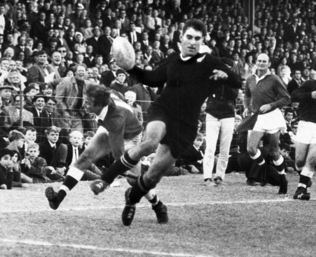 All Blacks lock Colin Meads evades a tackle during the tour of South Africa in 1970. PHOTO: THE...