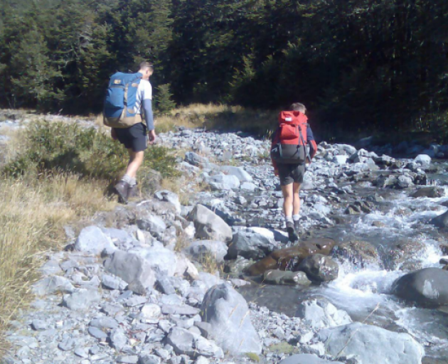 Simon McGrath (blue backpack) and his older brother Michael were very close and enjoyed tramping...