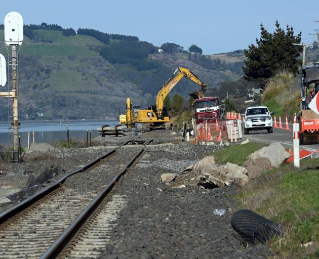 Downer crews work to finish the first stages of realigning the main trunk rail line between St...