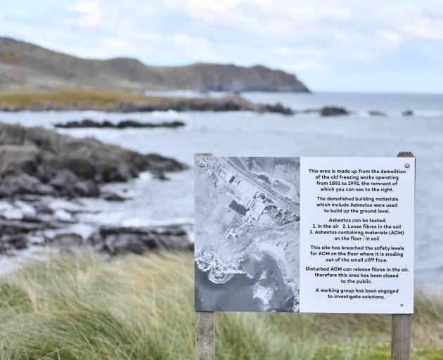 Signs at Ocean Beach in Bluff warn of the presence of asbestos.PHOTO: LAURA SMITH

