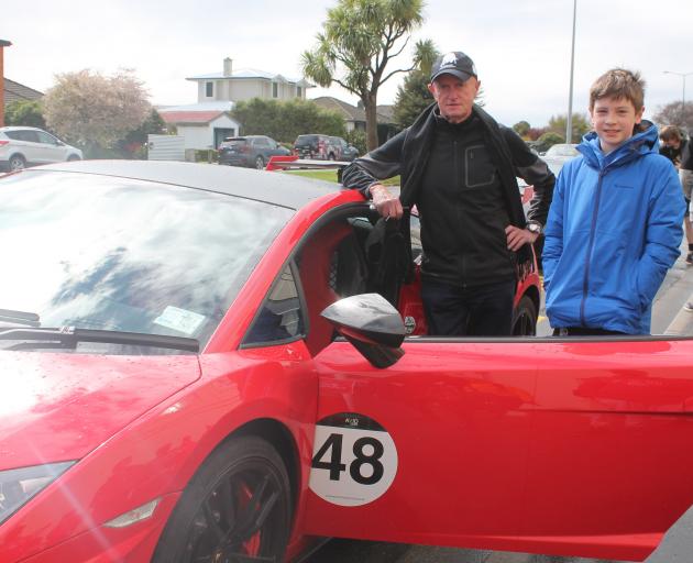Cromwell man Steve Lyttle shows his Lamborghini to Bede Scully, of Invercargill.