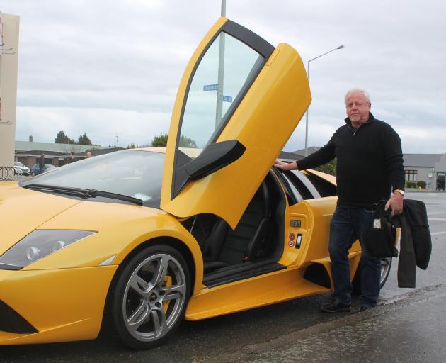 Invercargill man Colin Clay’s Lamborghini attracted attention from car enthusiasts. PHOTOS: LUISA...