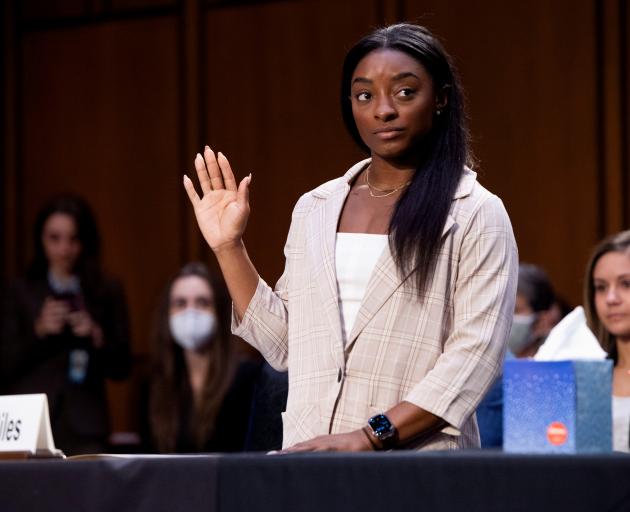 U.S. Olympic gymnast Simone Biles is sworn in to testify during a Senate Judiciary hearing about the Inspector General's report on the FBI handling of the Larry Nassar investigation. Photo: Reuters
