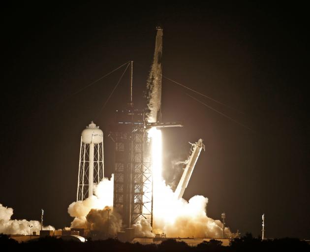 The SpaceX Falcon 9 rocket, with the Crew Dragon capsule, launched from the Kennedy Space Center...