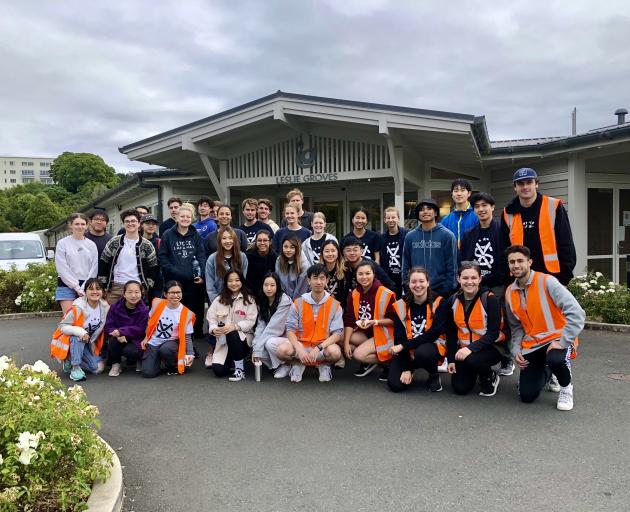 Members of the Otago Student Volunteer Army after doing some garden maintenance at a retirement...