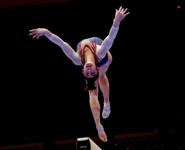 American Kayla DiCello competes in the women’s all-around gymnastics final in Kitakyushu, Japan,...