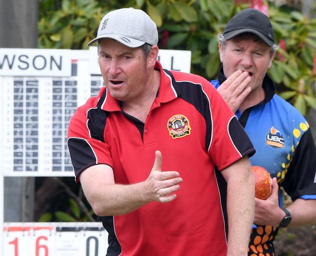 Sean O’Neill (front) watches his bowl in his clash against Gary Lawson in the North East Valley...