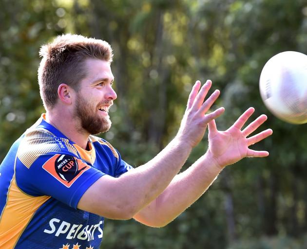 Otago loose forward Charles Elton catches a ball at training at Logan Park this week. PHOTO:...
