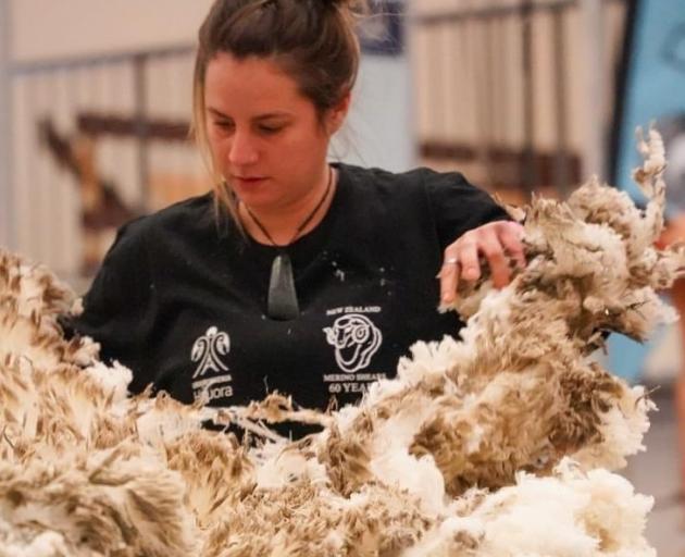 Woolhandler Jess Toa in action during the New Zealand Merino Shearing Championships at Alexandra...