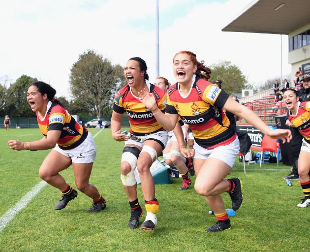 Waikato players celebrate off the bench after winning the Farah Palmer Cup over Canterbury. Photo...