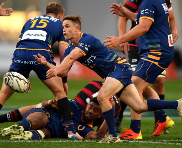 Kayne Hammington clears the ball for Otago during its win over Canterbury at Forsyth Barr Stadium...