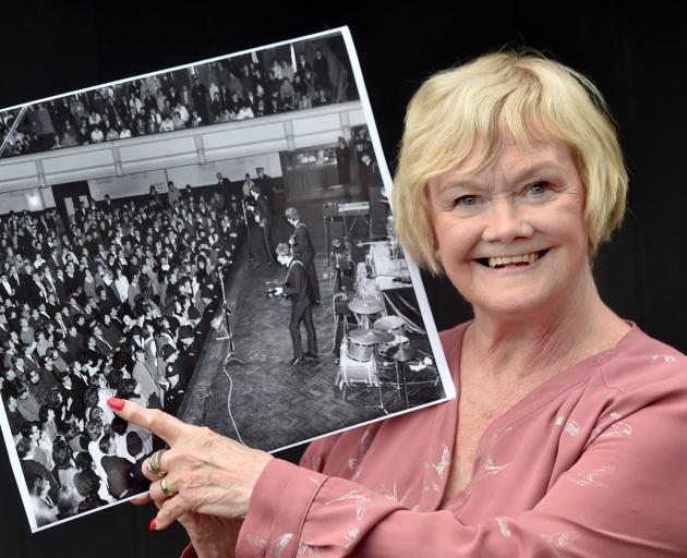 Gladys Hope points to her 13-year-old self at The Beatles  concert in the Dunedin Town Hall in...