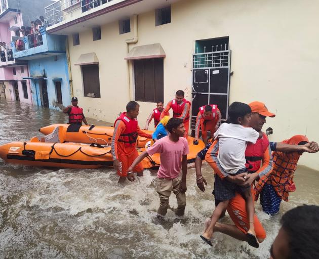 People have been evacuated to safer places from a flooded area in Udham Singh Nagar in the...