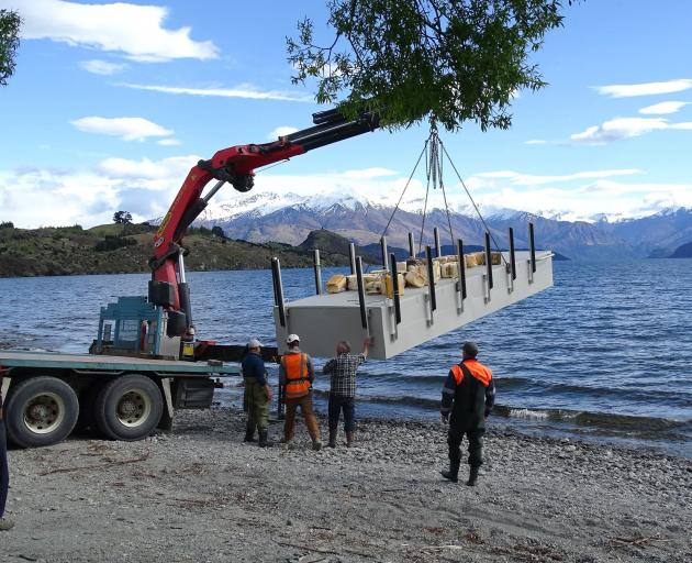 After a three-week onshore refurbishment, the Ruby Island jetty was delivered back on to Lake...