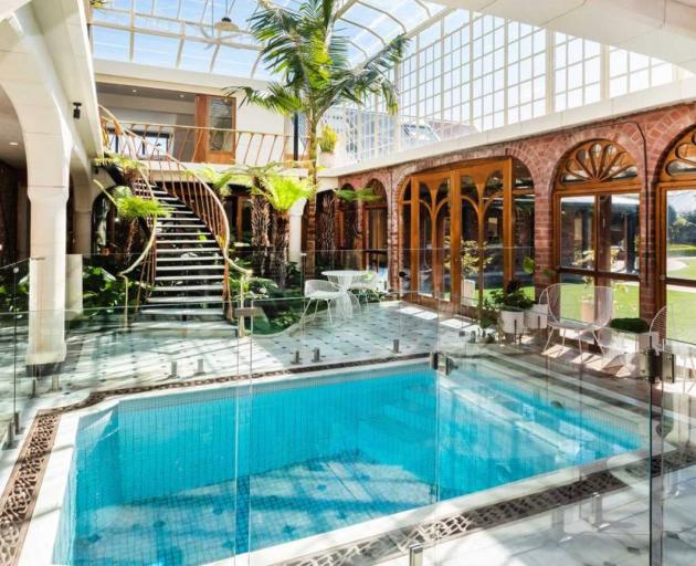 A heated plunge pool sits in the centre of the conservatory. Photo: Supplied