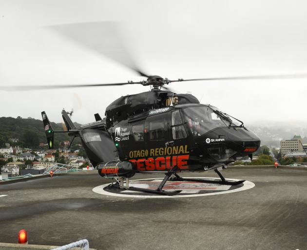 Helicopters Otago chief pilot Graeme Gale, and paramedics Doug Flett and Ian Ridley reflect on what a valuable addition the publicly funded Dunedin hospital helipad has been. Photo: Stephen Jaquiery